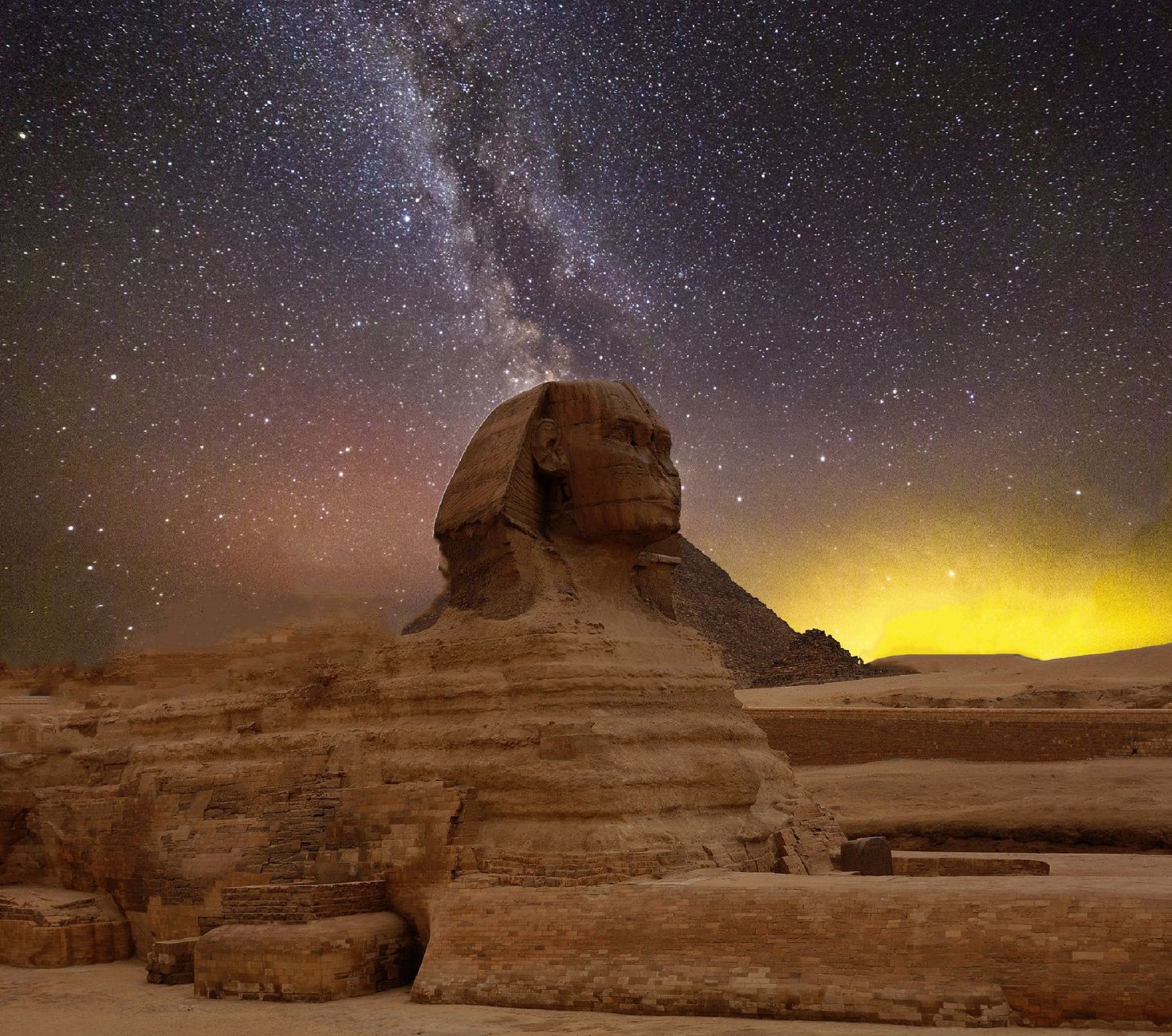 The Great Sphinx of Giza at night under a starry sky