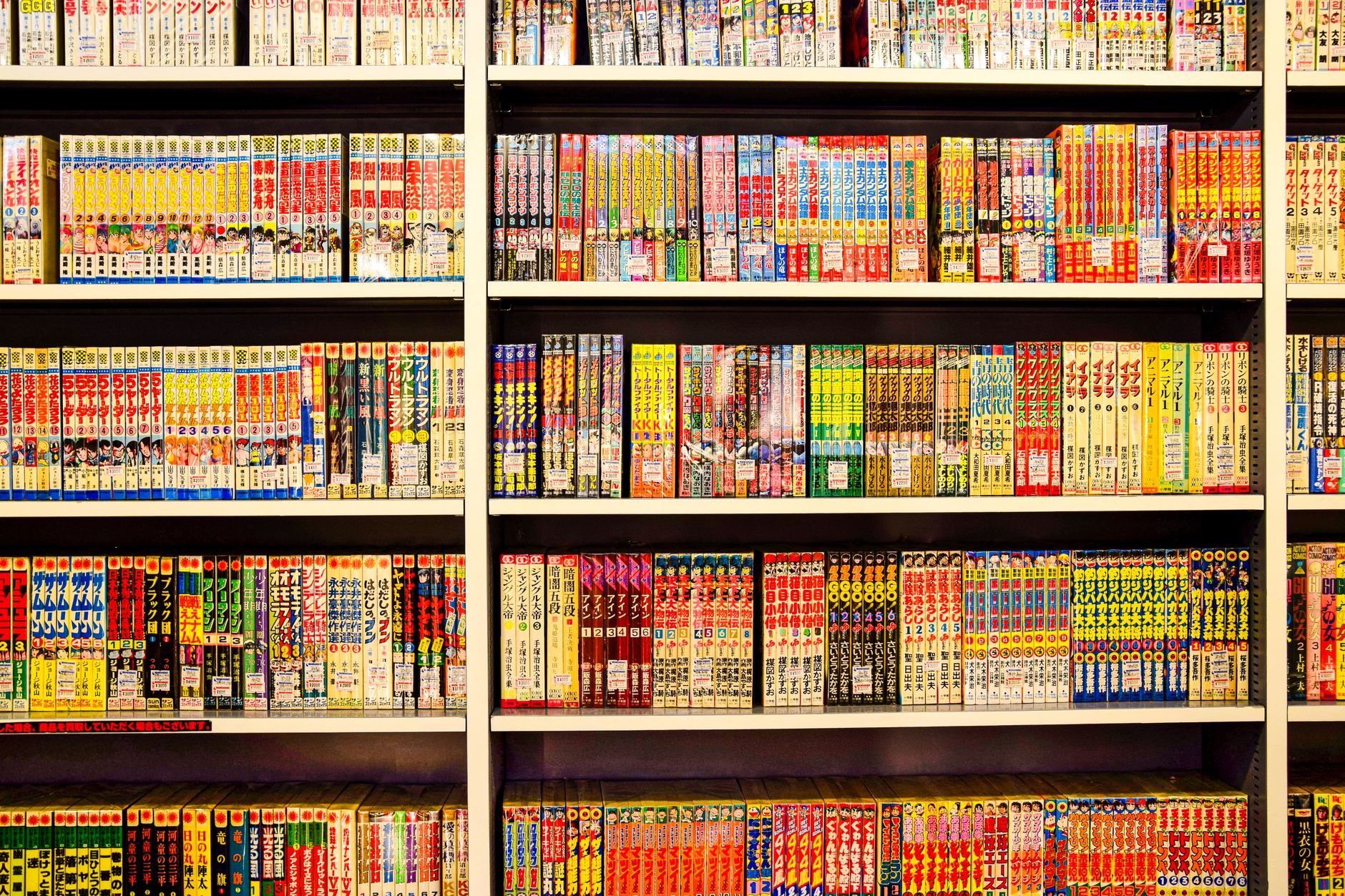 Shelves of manga books in a Japanese bookstore