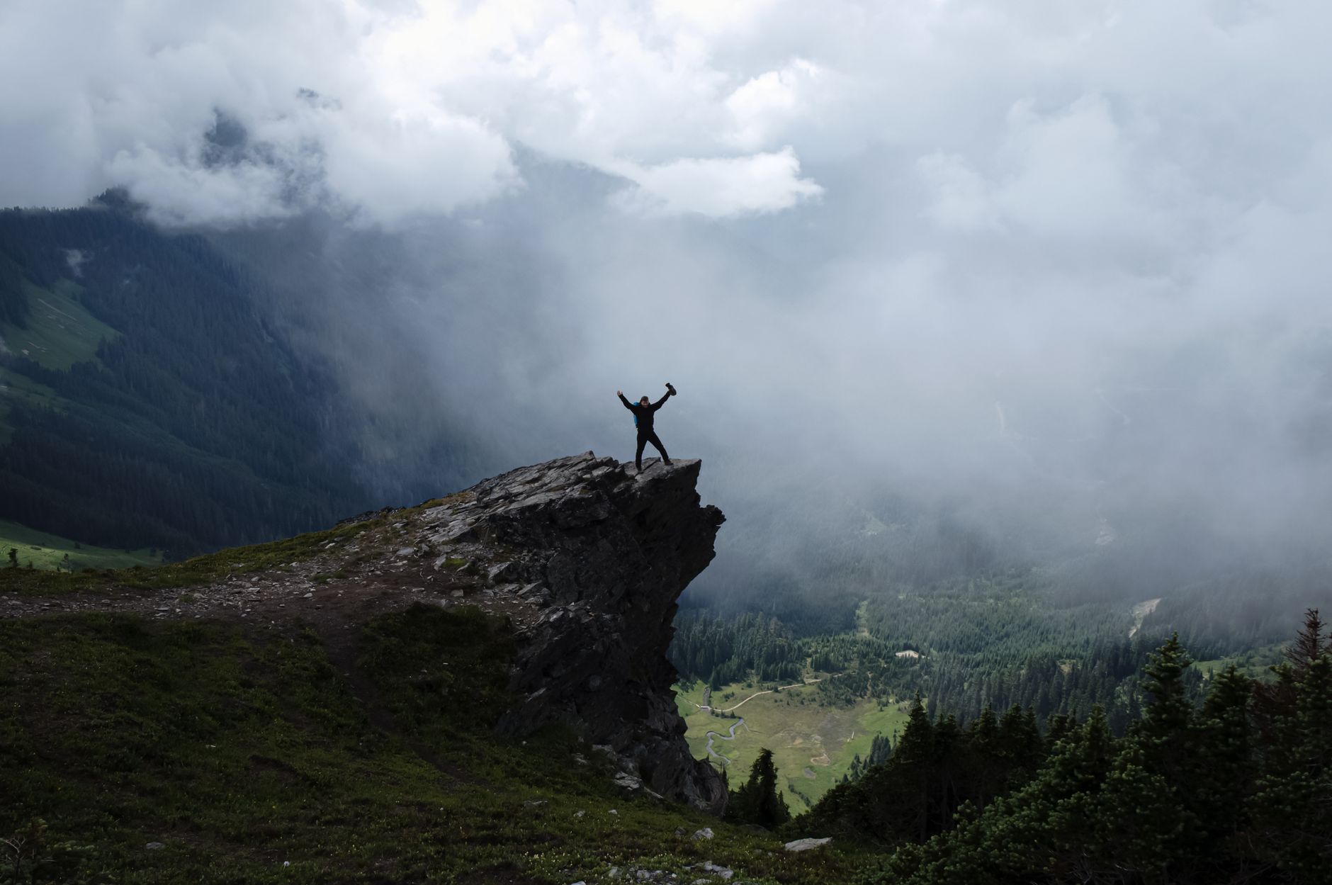 Rocky mountain summit with hiker