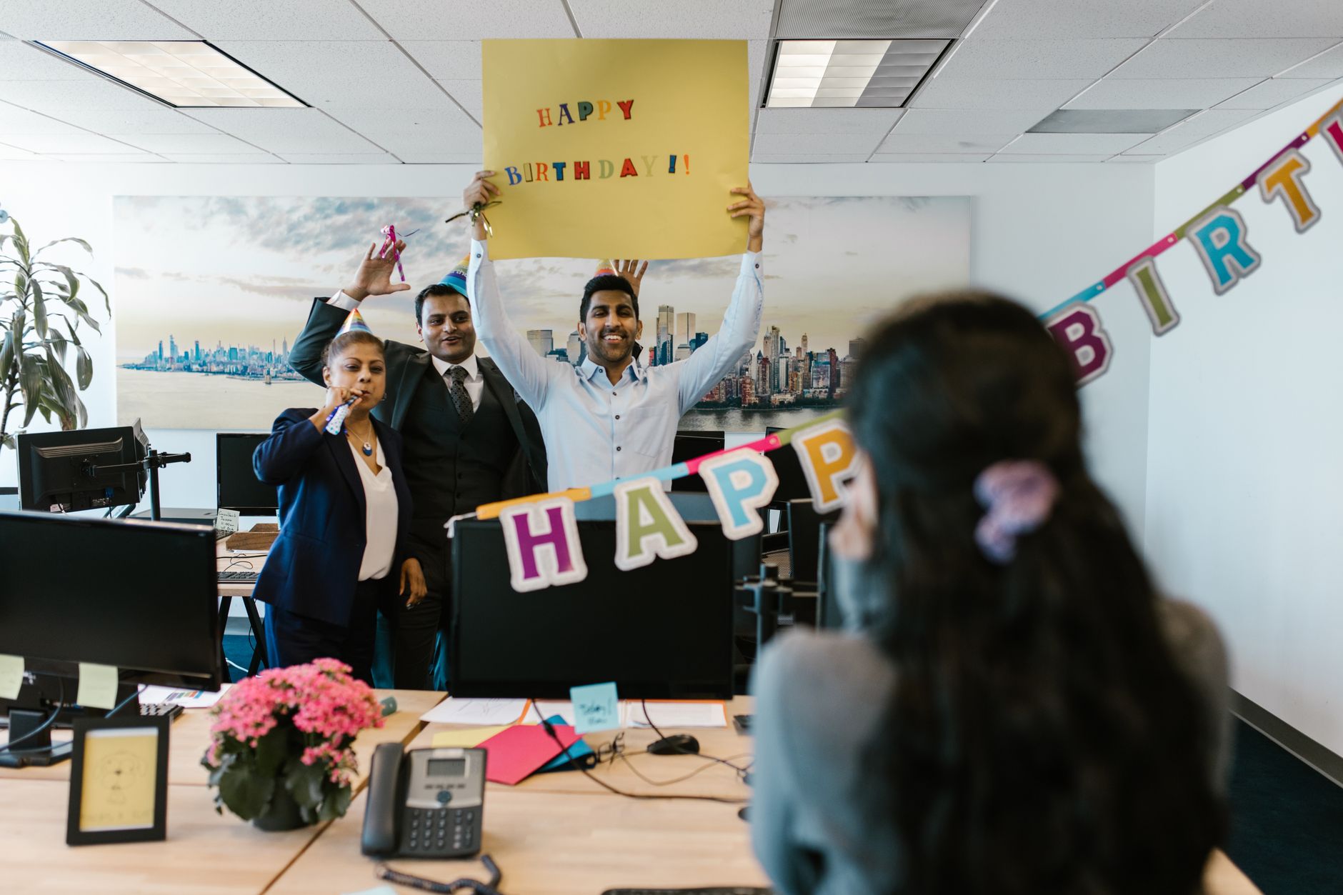Coworkers celebrating together at an office party