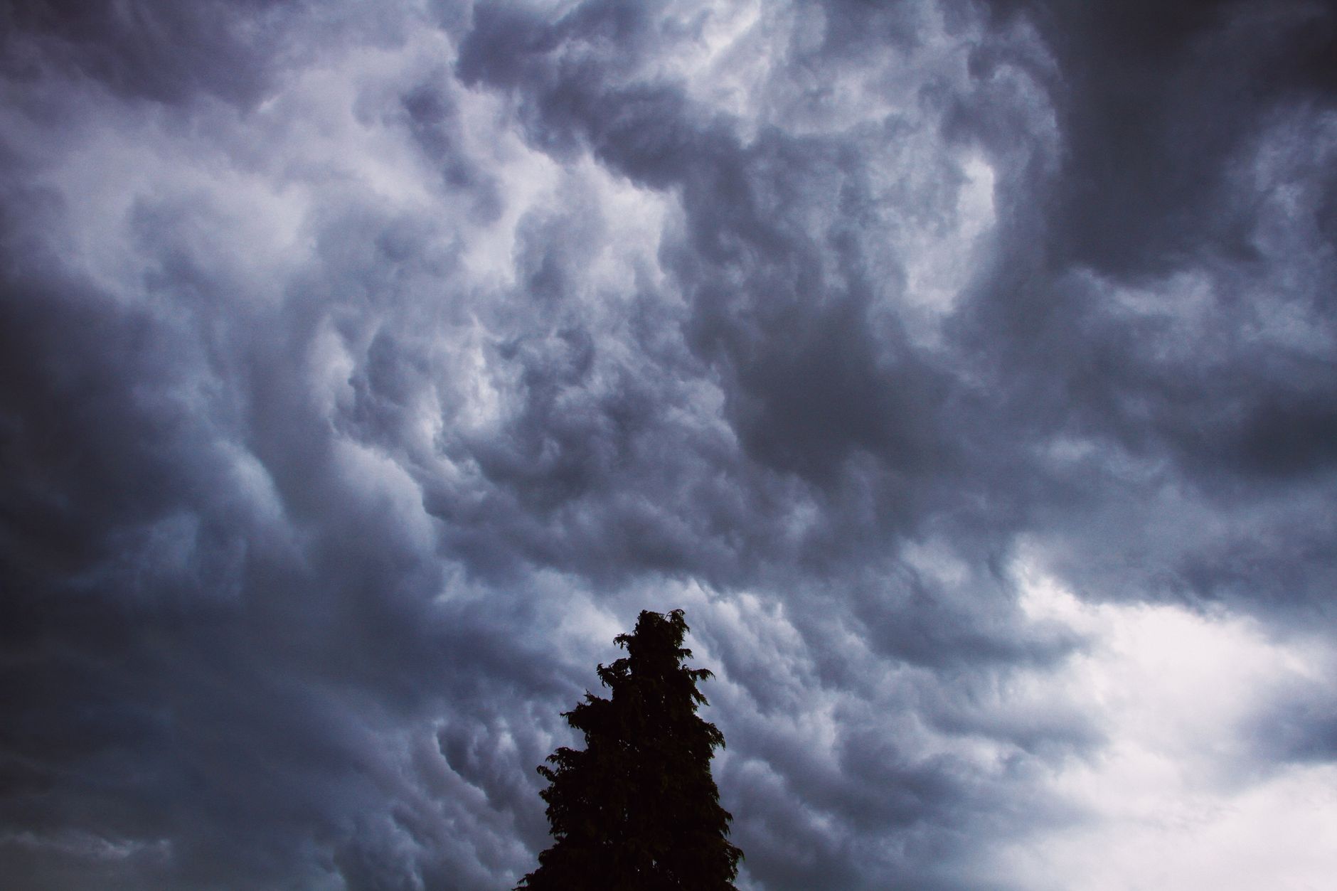 Windy sky with fast-moving clouds, symbolizing the free-spirited nature of the Air personality type