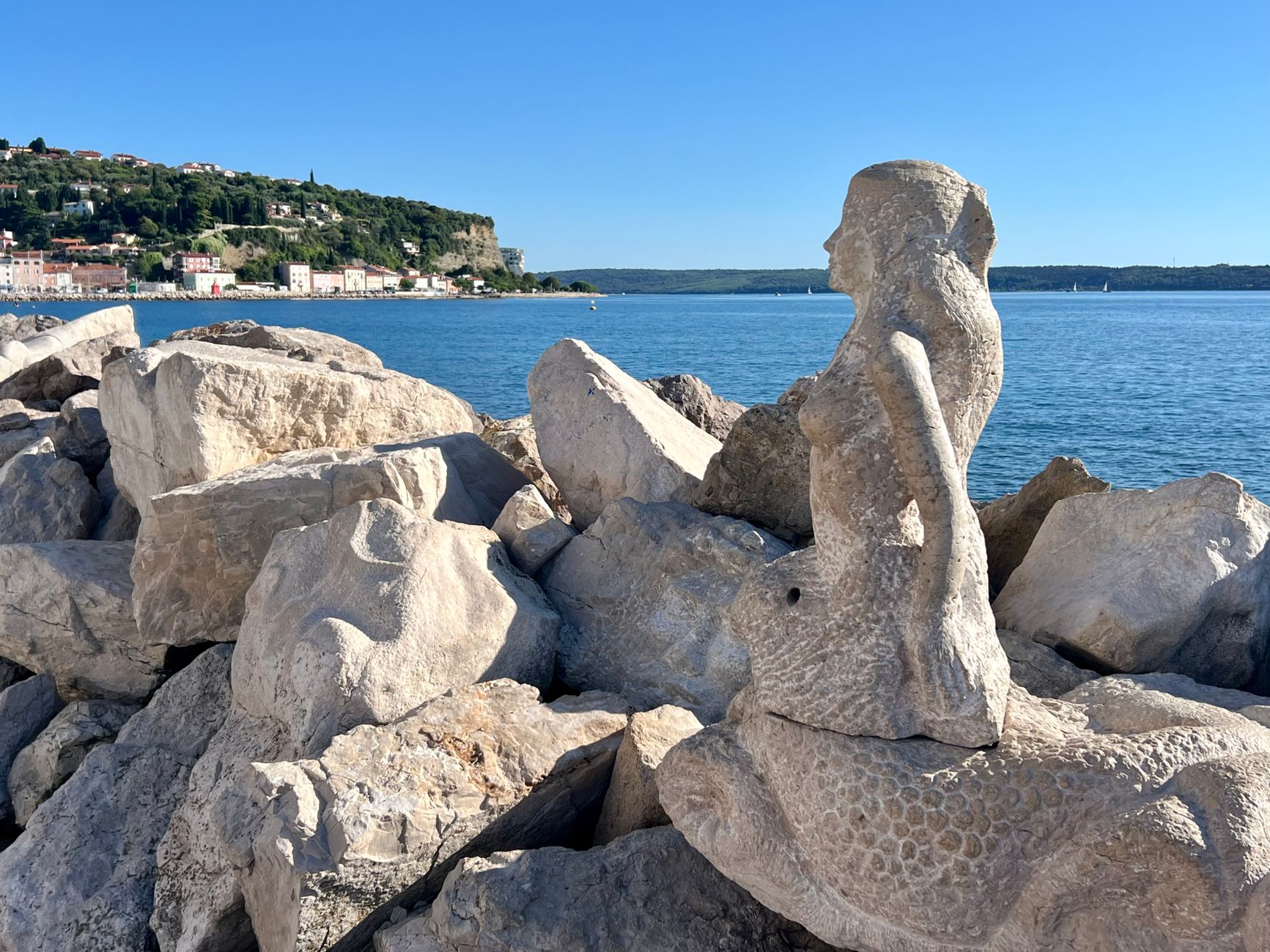 Detail of a mermaid sculpture tail